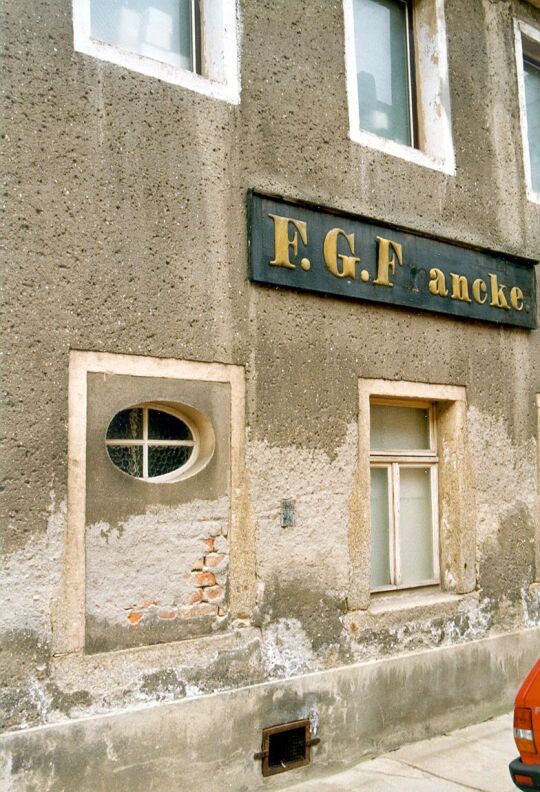 Firmenschild der Weinhandlung Francke in Bischofswerda