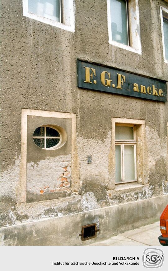 Firmenschild der Weinhandlung Francke in Bischofswerda