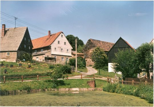 Bauernhöfe mit Dorfteich in Schlagwitz