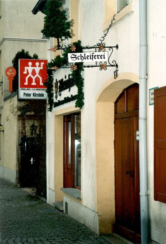 Geschmücktes Wohn- und Geschäftshaus in Schirgiswalde