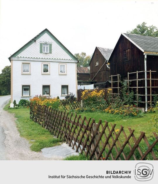 Wohnhaus mit Wirtschaftsgebäuden in Wohlbach