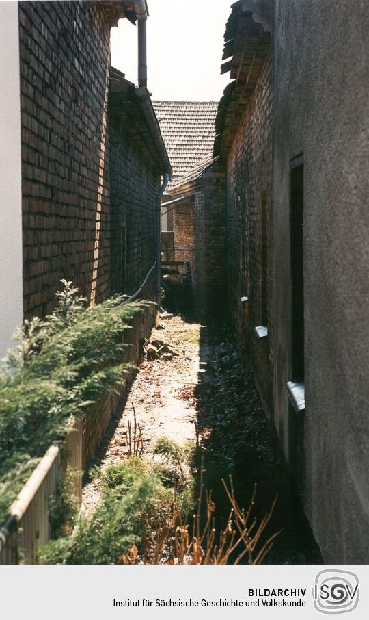 Blick zwischen zwei Schleifer Grundstücke