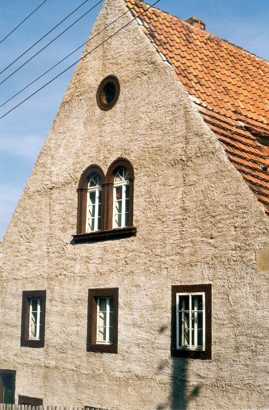 Giebelseite eines ehemaligen Bauernhofes in Herbergen