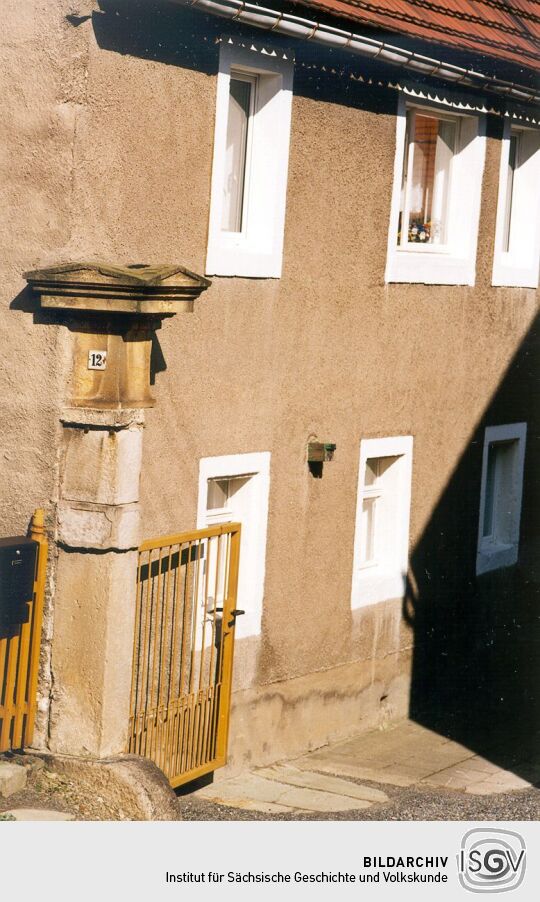 Torsäule in einem ehemaligen Bauernhof in Herbergen