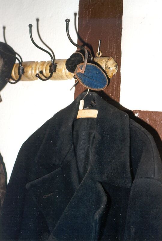 Kutschermantel und Ohrschützer