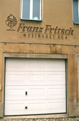 Bild: Alte Firmenreklame an einem Pulsnitzer Haus