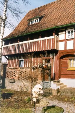 Bild: Fachwerkhaus mit Umgebinde und Oberlaube in Ebersbach