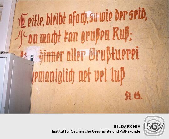 Spruch an der Wand in einenm Treppenhaus in Lauter