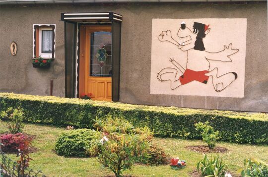 Wandbild an einem Haus in Staupitz