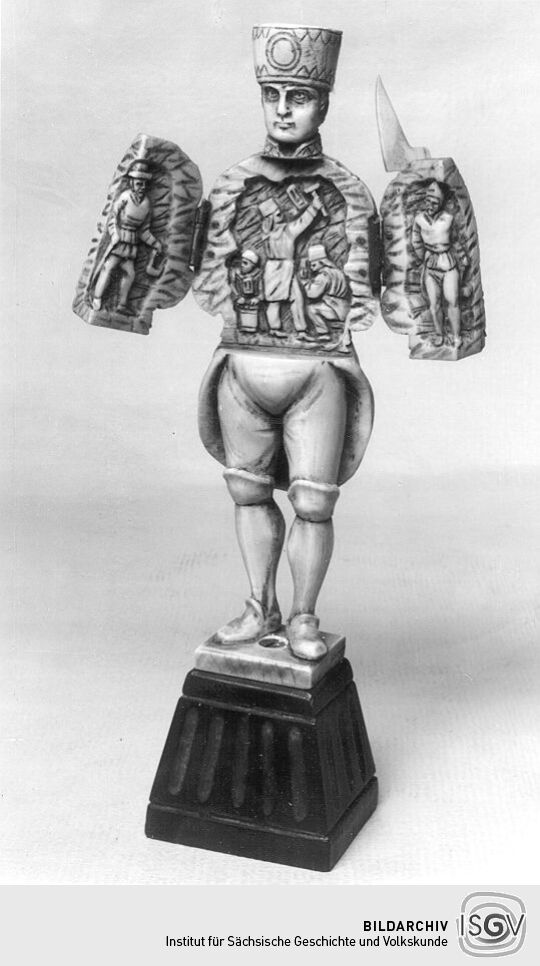 Bergmann mit Steigerhäckchen und Frosch