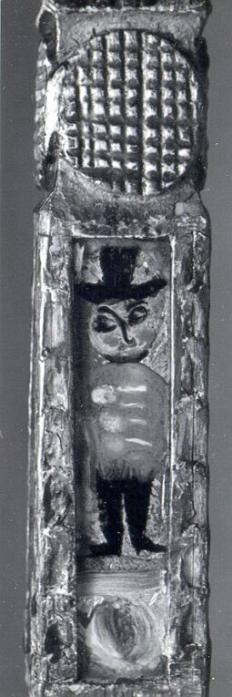 Bild: Teilstück des geschnitzten Spinnrockens