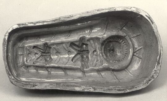 Backform aus Keramik mit Jesuskind-Motiv