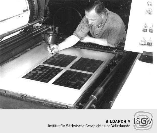 Lichtdrucker bei der Arbeit