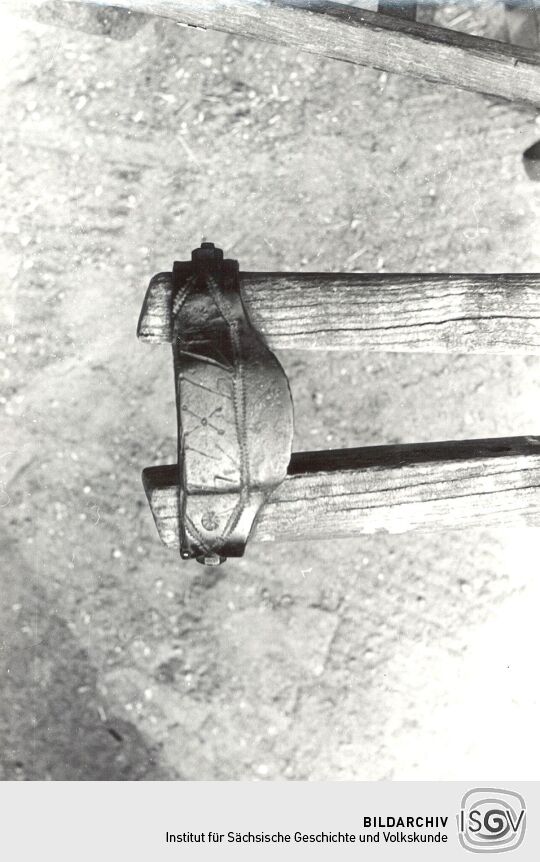 Kunstschmiedearbeit an einem Ackerwagen aus Bluno