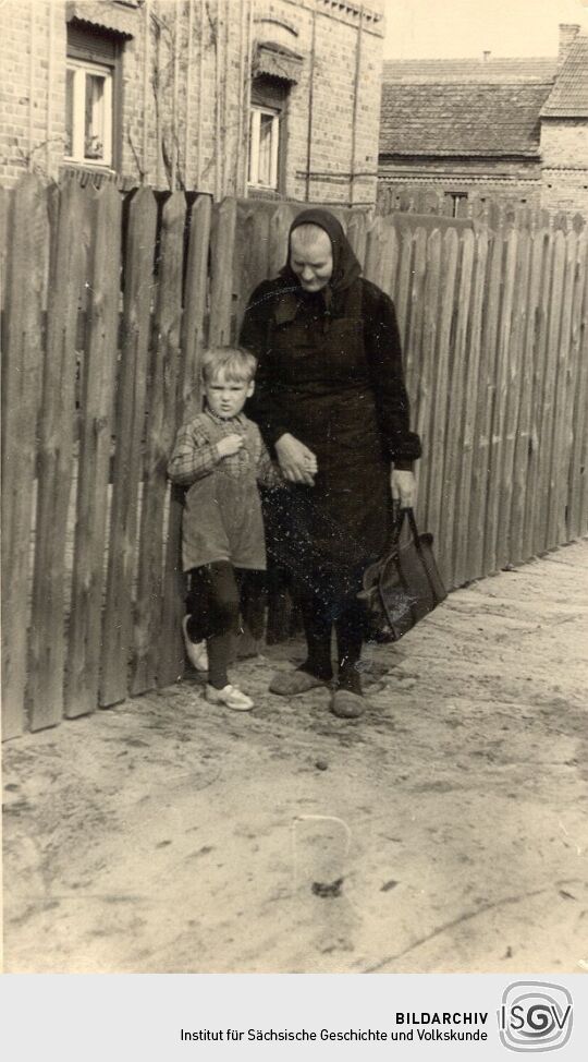 Frau mit Kind in Tzschelln