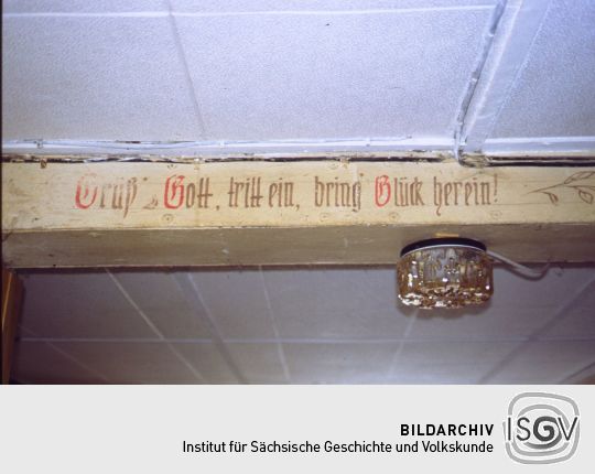 Spruch in einem Treppenhaus in Lauter