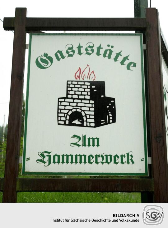 Werbetafel für die Gaststätte "Am Hammerwerk" in Schmalzgrube