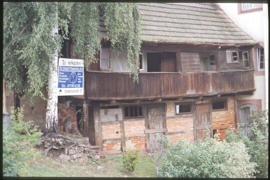 Gebäude in Penig mit Verkaufsbanner