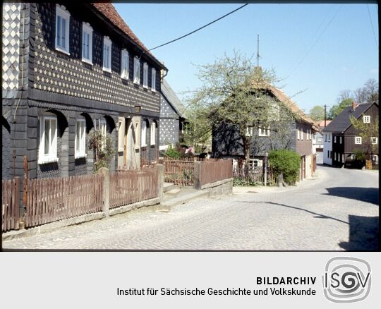 Ortsansicht mir verschieferten Umgebindehäusern in Obercunnersdorf 1986