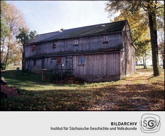 Holzgebäude in Landwüst