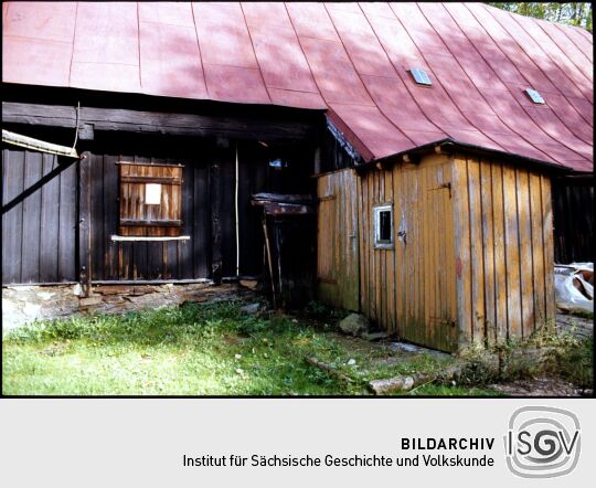 Detail eines Holzgebäudes in Landwüst