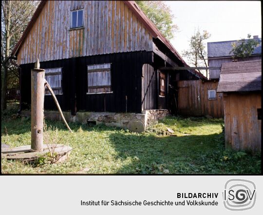 Holzgebäude in Landwüst