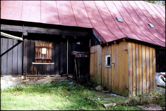 Holzgebäude in Landwüst