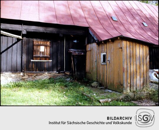 Holzgebäude in Landwüst