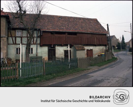 Fachwerkgebäude mit einem Laubengang An der Skala in Georgewitz