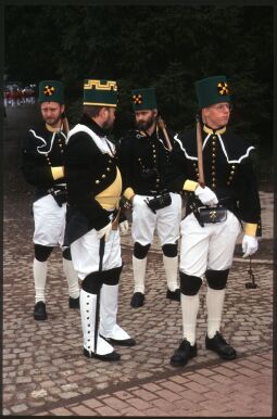 Vier Männer in Bergmannsuniformen