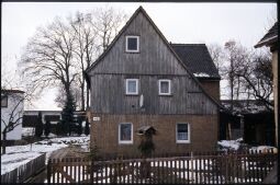 Bild: Gebäude mit verbretterten Obergeschossen in Kleinröhrsdorf